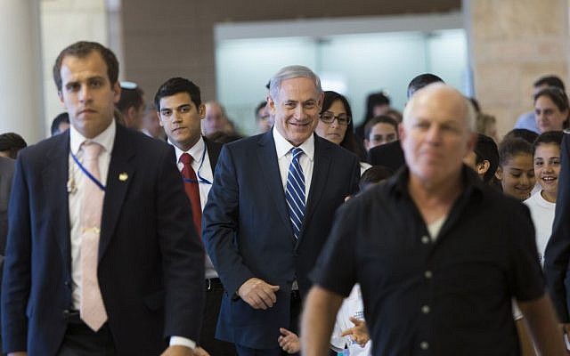 Prime Minister Benjamin Netanyahu (center) in the Israeli parliament, November 10, 2014. (photo credit: Yonatan Sindel/Flash90)