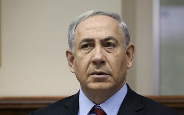 Prime Minister Benjamin Netanyahu speaks during the weekly cabinet meeting on, November 16, 2014. (photo credit: Amit Shabi/POOL)