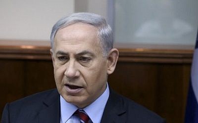 Prime Minister Benjamin Netanyahu speaks during the weekly cabinet meeting on Sunday, November 16, 2014. (photo credit: Amit Shabi/POOL)