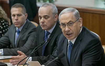Prime Minister Benjamin Netanyahu, with Ministers of Intelligence Yuval Steinitz (C) and Interior Gilad Erdan, during the weekly cabinet meeting in Jerusalem, on Sunday, November 23, 2014. Photo by Ohad Zwigenberg/POOL/FLASH90