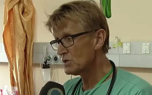 Norwegian doctor Mads Gilbert at Gaza's Shifa Hospital during 2014's Operation Protective Edge (screen capture: YouTube)