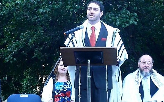Chief Rabbi of Canberra, Australia Alon Meltzer giving a speech at his inauguration in November 2014. (screen capture: YouTube/Alon Meltzer)