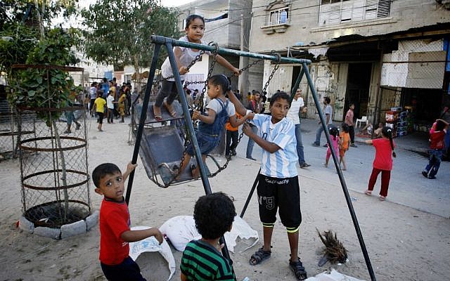 Palestinian children play on a street in Rafah, southern Gaza Strip, October 4, 2014 [photo credit: Abed Rahim Khatib/Flash90]