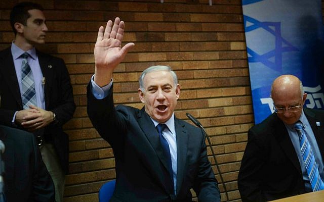 Prime Minister Benjamin Netanyahu arrives at a press conference in Tel Aviv on December 11, 2014. (Ben Kelmer/Flash90)