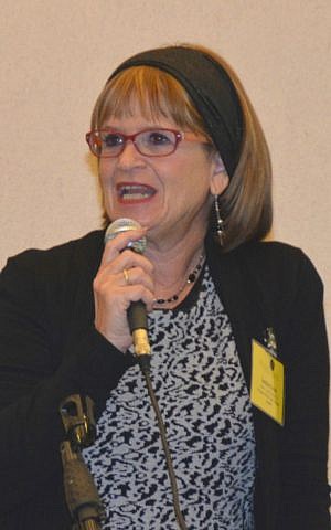 Tahel - Crisis Center for Religious Women and Children director Debbie Gross speaks at international conference on the Orthodox Jewish community confronting violence and abuse. December 1, 2014. (photo credit: Sharon Altshul)