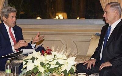 US Secretary of State John Kerry (left) meets with Israeli Prime Minister Benjamin Netanyahu at Villa Taverna in Rome, December 15, 2014. (photo credit: AFP/Evan Vucci)