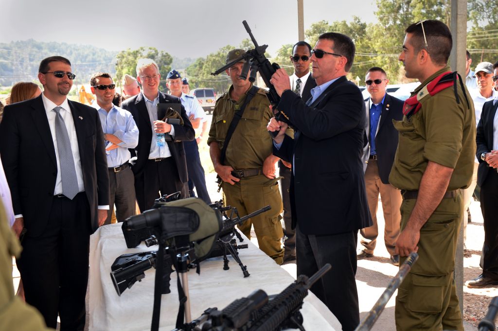 Ashton B. Carter, second from right, examines one of the weapons of the Israel Defense Force at a display at Mitkan Adam Army Base in Israel on July 21, 2013. (photo credit: Sgt. Aaron Hostutler, US Marine Corps/Department of Defense)