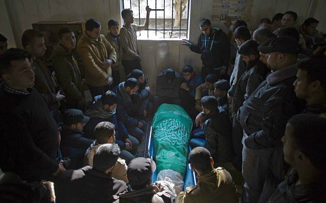 The December 24, 2014 Gaza funeral of Tayseir Smeiry, a Hamas operative, who was killed by Israeli troops after gunmen from Gaza opened fire on an IDF force within Israel (photo credit: AP Photo/ Khalil Hamra)