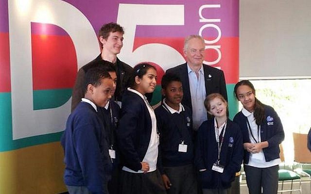UK Cabinet Office Minister Francis Maude with young participants in a computer coding contest at the D5 Forum in London, December 9, 2014 (Photo credit: Courtesy)