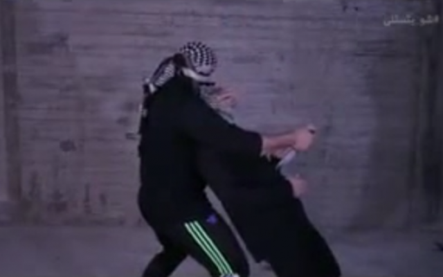 A screenshot of a Hamas instructional video on proper stabbing techniques. (screen shot: YouTube)