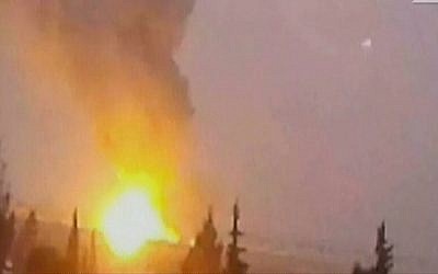 A picture said to show a fireball after an alleged Israeli strike on sites inside Syria on December 7, 2014. (Screen capture: Channel 2)