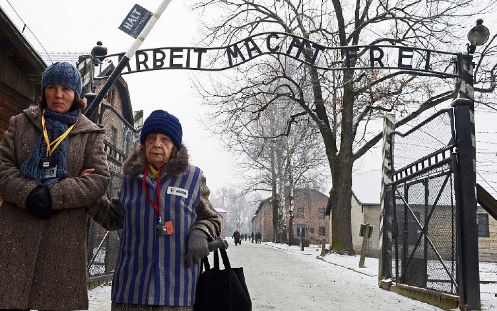 A concentration camp prisoner attending a ceremony at the memorial site of the former Nazi concentration camp Auschwitz-Birkenau on January 27, 2014. (AFP/JANEK SKARZYNSKI)