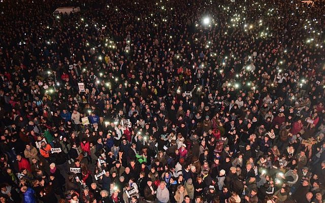 People gather in Toulouse on January 7, 2015, to show their solidarity for the victims of the attack by unknown gunmen on the offices of the satirical weekly, Charlie Hebdo. (photo credit: AFP / ERIC CABANIS)