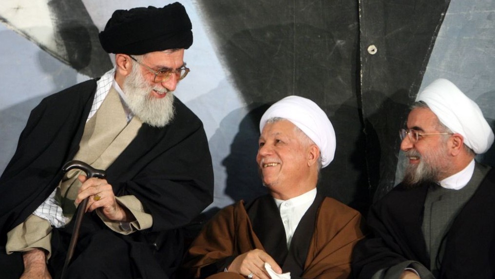 Iran's supreme leader Ayatollah Ali Khamenei, left, former president Akbar Hashemi Rafsanjani, center, and then top nuclear negotiator (now president) Hassan Rouhani, in Tehran, March, 9, 2006. (photo credit: AP Photo)