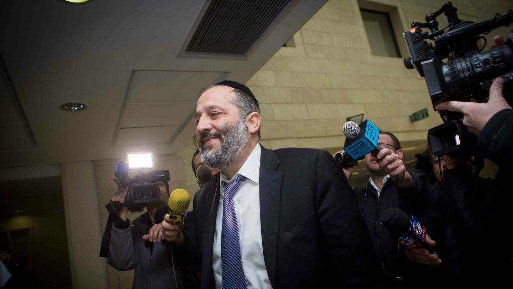 Shas leader Aryeh Deri arrives at the party's Jerusalem headquarters, January 12, 2015. (Miriam Alster/FLASH90)