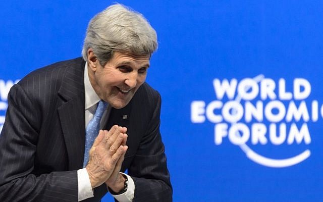 US Secretary of State John Kerry bows to someone after his speech during a panel session at the World Economic Forum, in Davos, Switzerland, Friday, Jan. 23, 2015. (photo credit: AP/Keystone, Laurent Gillieron)