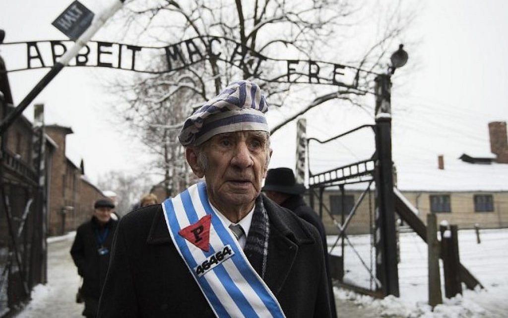 Auschwitz survivor Miroslaw Celka after paying tribute to fallen comrades at the 'death wall' execution spot in the former Auschwitz concentration camp in Oswiecim, Poland, on the 70th anniversary of the liberation of the Nazi death camp on January 27, 2015. (AFP/Odd Andersen)