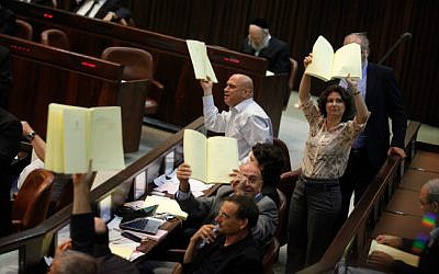 MKs form Balad and Hadash during a plenum session voting on the state budget, in the Knesset, Jerusalem, July 29, 2013 (photo credit: Flash90) 
