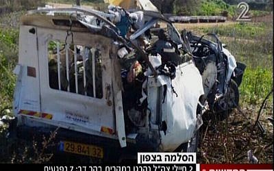 An Israeli military vehicle after being hit by a Kornet anti-tank missile along the northern border on January 28, 2015. (Screen capture: Channel 2)