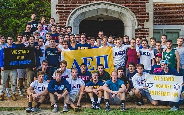 Following the defacement of Emory University's AEPi house with swastikas last September, members of the AEPi chapter at Washington University in St. Louis posed in front of their house with signs in support of their Emory brothers and against anti-Semitism (courtesy)