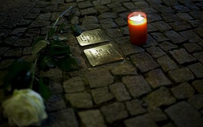 Illustrative image of a 'Stolperstein,' or stumbling stone, in Berlin, November 9, 2013. (AFP/Johannes Eisele)