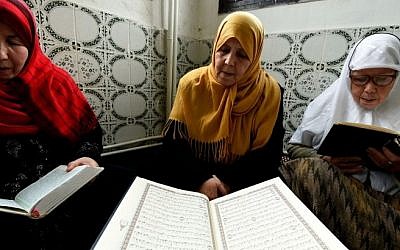Hundreds of female religious guides have been at the forefront of Algeria's battle against Islamic radicalisation since the civil war that devastated the North African country in the 1990s. (Photo credit: AFP/FAROUK BATICHE)