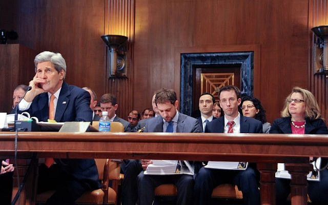 John Kerry, far left, speaking to US lawmakers in Washington on February 24, 2015. (photo credit: US State Department)