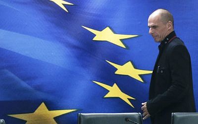 Greece's new Finance Minister Yanis Varoufakis arrives for a handover ceremony at the Finance Ministry in Athens, Wednesday, Jan. 28, 2015 (photo credit: Petros Giannakouris/AP Photo)