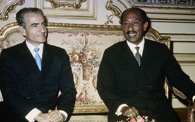 President Anwar Sadat (right) hosts the shah of Iran, Mohammad Reza Pahlavi, at Kubbeh Republican Palace in Cairo, Egypt, on January 9, 1975. (photo credit: AP/Ahmed Tayeb)