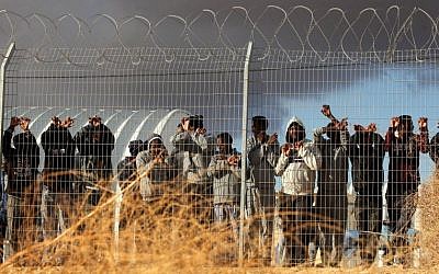 African migrants protest outside the Holot detention center in the Negev Desert in southern Israel, February 17, 2014. (Flash90)