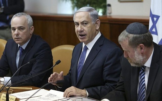 Prime Minister Benjamin Netanyahu leads the weekly cabinet meeting at the Prime Ministers Office in Jerusalem, February 15, 2015. (photo credit: Amit Shabi/POOL)