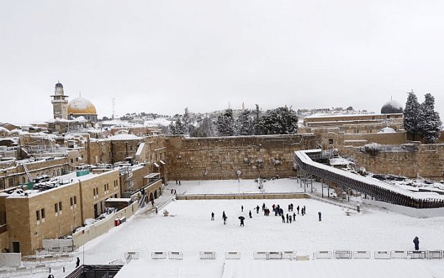View of the Western Wall in the Old City of Jerusalem covered in snow, February 20, 2015. (photo credit: Yonatan Sindel/Flash90)