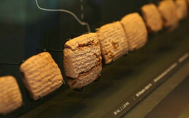 This undated photo provided by the Bible Lands Museum Jerusalem shows tablets containing cuneiform writing, one of the world's earliest scripts, on display in Jerusalem. (AP Photo/Avi Noam, Bible Lands Museum)