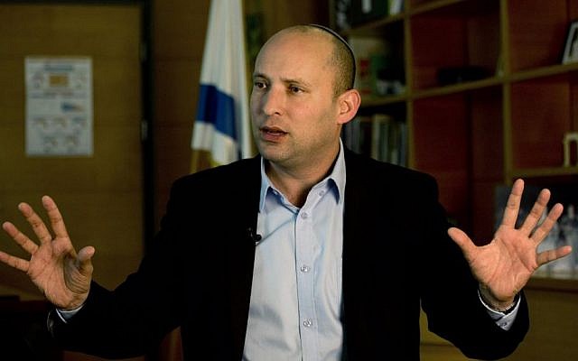 Economy Minister Naftali Bennett, leader of the Jewish Home party, speaks during an interview to The Associated Press in Jerusalem, Monday, February. 16, 2015. (photo credit: AP/Tsafrir Abayov)