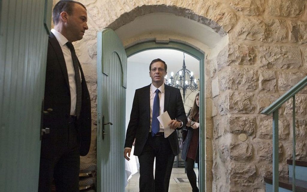 Israel's Labor Party leader Isaac Herzog arrives to a press conference in Jerusalem, Tuesday, Feb. 24, 2015. (photo credit: AP Photo/Dan Balilty)