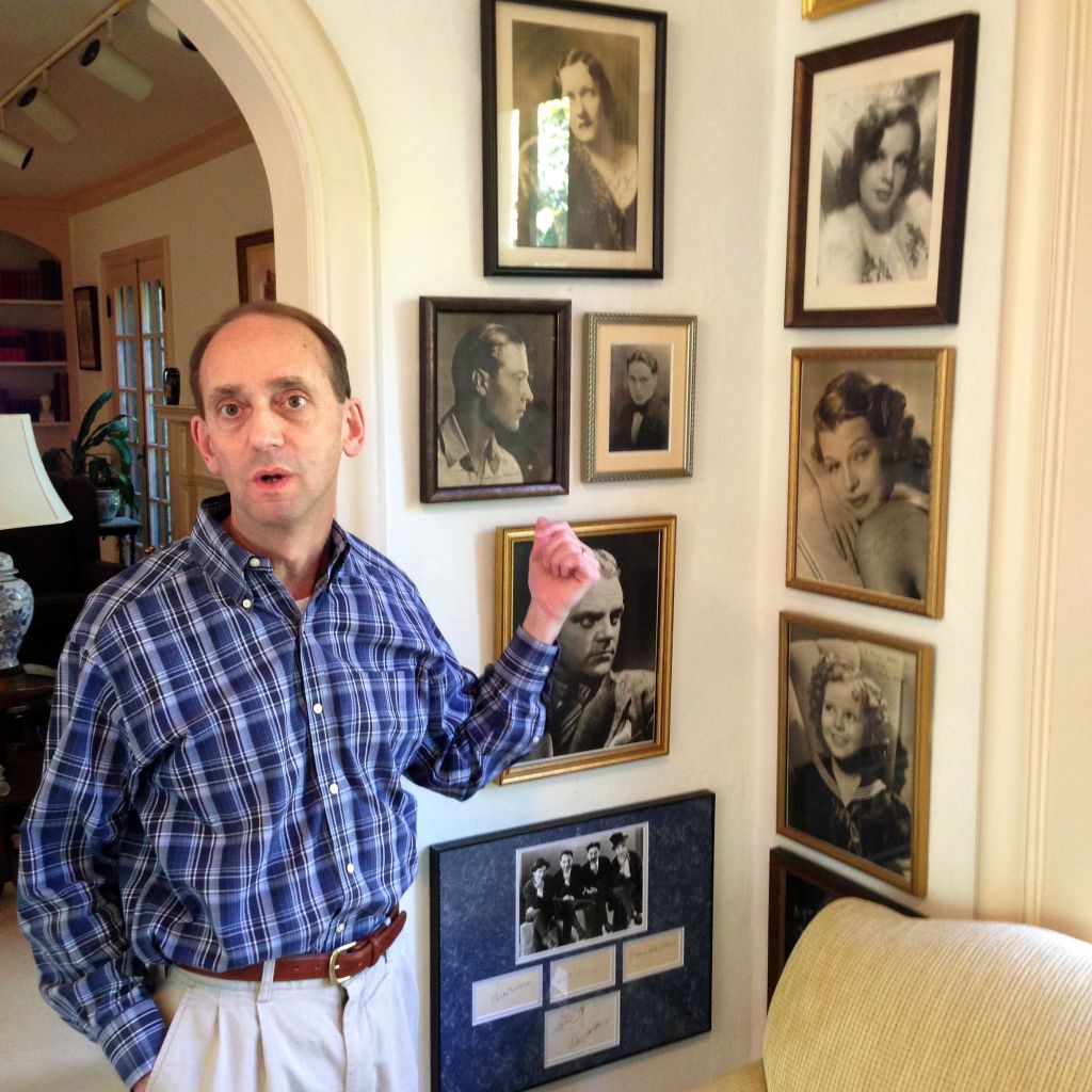 In this Oct. 16, 2014 file photo Missouri Auditor Tom Schweich shows off some of the movie-star photos in his collection of autographed memorabilia from the golden age of Hollywood at his home in Clayton, Mo. Schweich, a Republican candidate for governor, died Thursday Feb. 26, 2015 of a self-inflicted gunshot wound, a staff member told The Associated Press. (photo credit: AP/David A. Lieb, File)