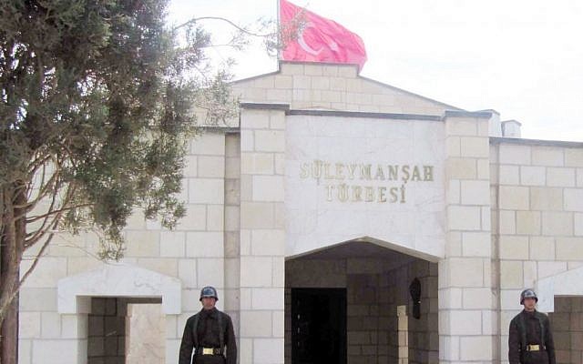 In this April 7, 2011 file photo, Turkish soldiers stand guard at the entrance of the memorial site of Suleyman Shah, grandfather of Osman I, founder of the Ottoman Empire, in Karakozak village, northeast of Aleppo, Syria. (photo credit: AP)