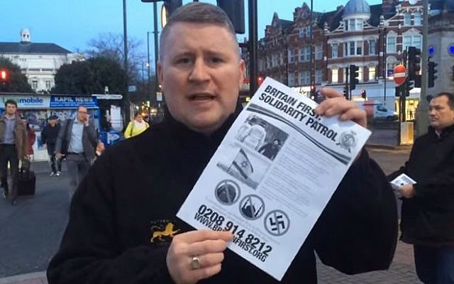 Britain First leader Paul Golding handing out leaflets on 'solidarity patrol' in a Jewish neighborhood of London, January 2015. (YouTube screenshot)