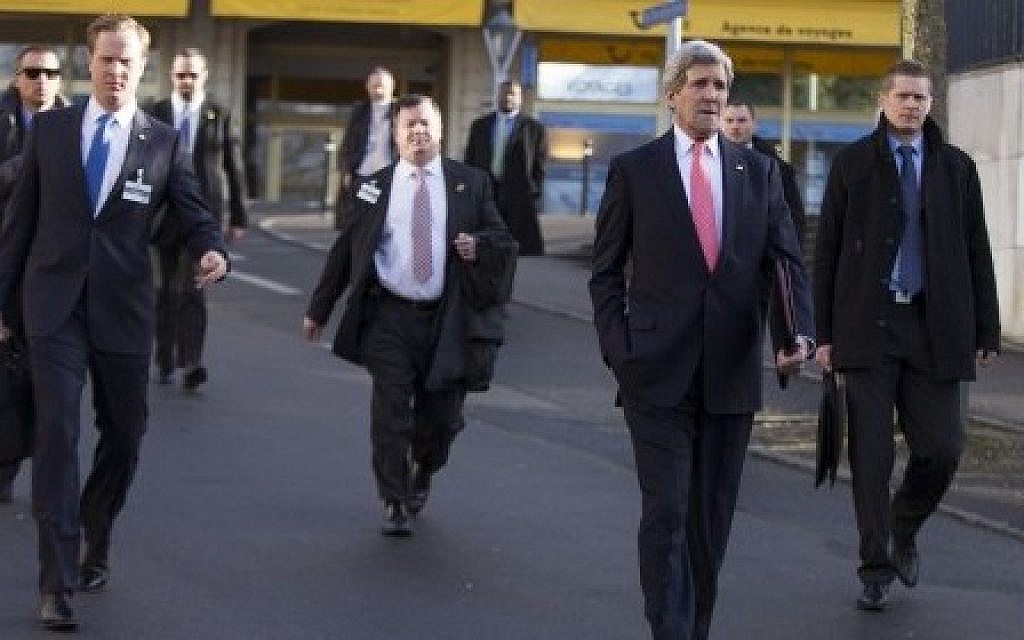 US Secretary of State John Kerry walks with members of his delegation ahead of a meeting with Iranian Foreign Minister Mohammad Javad Zarif for a new round of nuclear negotiations on March 3, 2015, in Montreux, Switzerland. (Photo credit: AFP)