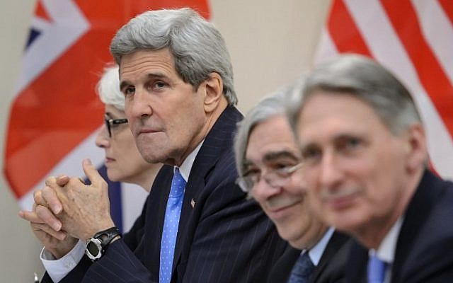 From left to right: US Under Secretary for Political Affairs Wendy Sherman, US Secretary of State John Kerry, US Secretary of Energy Ernest Moniz and British Foreign Secretary Philip Hammond wait for a P5+1 meeting at the Beau Rivage Palace Hotel March 29, 2015 in Lausanne. (photo credit: AFP / FABRICE COFFRINI)