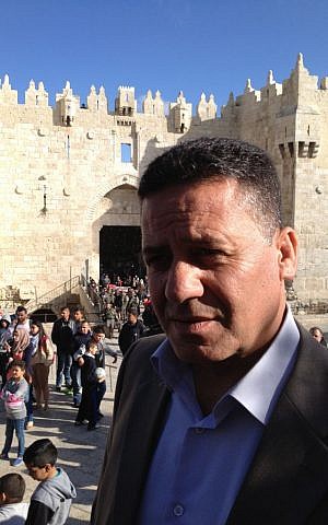 Jerusalem businessman and political activist Youssef Mkheimar demonstrates across from Damascus Gate in Jerusalem, March 30, 2015 (photo credit: Elhanan Miller/Times of Israel)