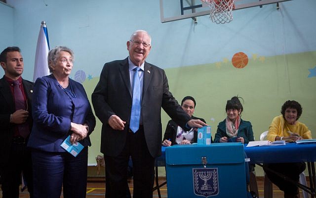 Israeli President Reuven Rivlin casts his vote at a polling station in Jerusalem on March 17, 2015. (Photo credit: Miriam Alster/Flash90)