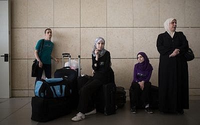 Palestinians wait at the Erez Crossing between Gaza and Israel, July 13, 2014 (photo credit: Flash90)
