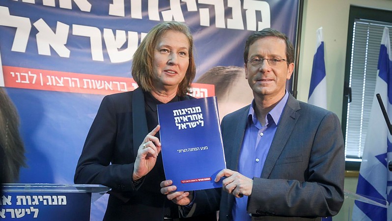Tzipi Livni and Isaac Herzog of Zionist Union present their party's "Responible Leadership in Israel" agenda, at a press conference in Tel Aviv on March 08, 2015.(photo credit: FLASH90)