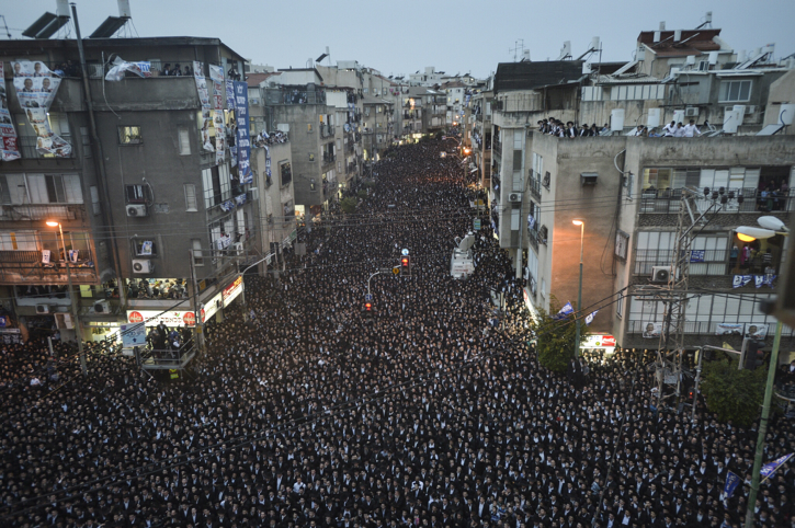 Tens of thousands of ultra-Orthodox Israelis attend a United Torah Judaism party rally in the city of Bnei Brak on March 11 ahead of next week's elections. (photo credit: Flash90)