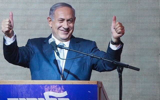 Prime Minister Benjamin Netanyahu greets supporters and hails victory at the Likud party's election headquarters in Tel Aviv, Tuesday, March 17, 2015. (Photo credit: Miriam Alster/FLASH90) 