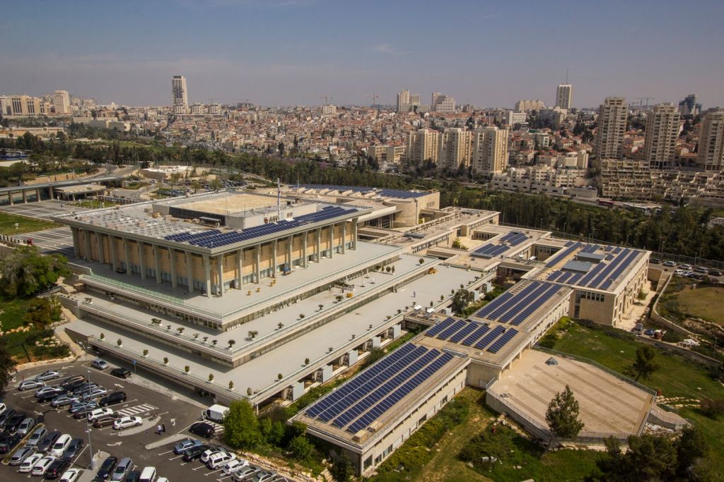 An aerial view of the Knesset showcasing the solar panels on its roof and on adjacent buildings. The panels will be able to produce up to a third of the Knesset's energy consumption. (photo credit: Courtesy Knesset)