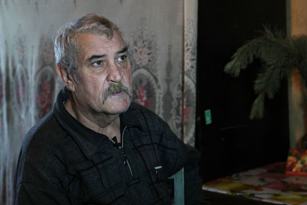 In Artemovsk, homebound pensioner Leonid Annov, 67, lives with his wife and grandson in an uninsulated apartment in eastern Ukraine. (courtesy JDC)