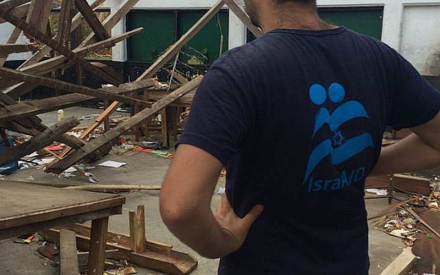 IsraAid volunteers helping locals on the cyclone-battered island-nation of Vanuatu, March 2011 (photo credit: courtesy)