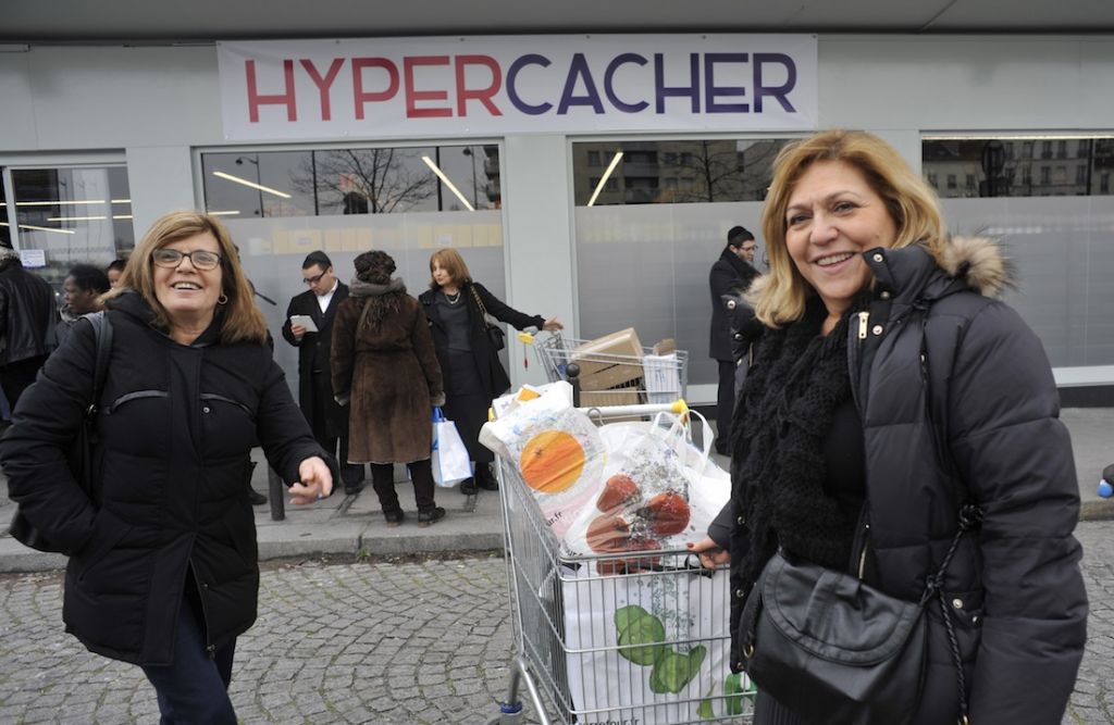 Shoppers outside the Hyper Cacher market near Paris, where four people were murdered in January. The shop reopened on March 15, 2015. (Serge Attal/Flash90/JTA)